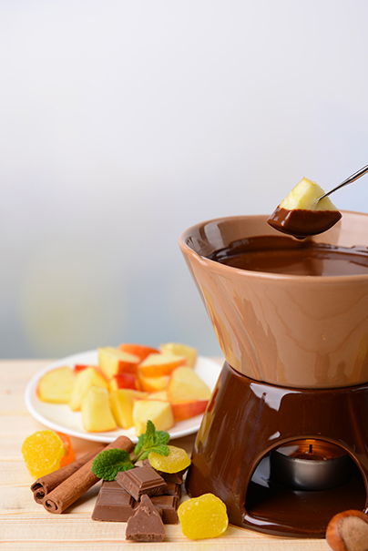 Chocolate fondue with fruits,